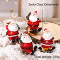 Lot de quatre figurines de Père Noël en résine de 8 cm pour décoration de Noël - Ensemble Figurines Père Noël Aléatoire 4 Pièces