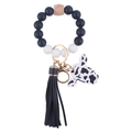 Silicone bead keychain bracelet with black cow head pendant and faux leather tassel - Black
