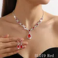 Macro detail of red crystal necklace and earring set with shimmering white rhinestones - Red Crystal Style (BL019-红水晶)