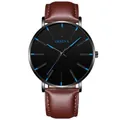 Detail shot of Geneva watch with brown leather strap and blue markers on black dial - Leather Strap Brown Band Black Case Blue Hands