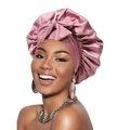 Silk satin sleep bonnet in soft pink with an elegant ribbon bow for hair care - Bean Paste Pink