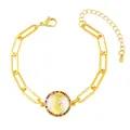 Detail of a gold paperclip chain bracelet with a colorful zircon Virgin Mary pendant - Style E