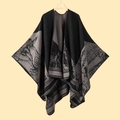 Knitted shawl poncho in black and grey with animal pattern on wooden hanger display - 130x150cm / Mountain Deer Black Grey