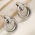 Minimalist silver triple hoop earrings with a polished metallic finish in a layered design - Triple Ring Interlocking Style (6513) / 31 White K Polished