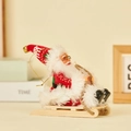 Christmas Santa Claus plush ornament on wooden sled with red knit hat and gold bell - Sled Style (Red & White Floral)