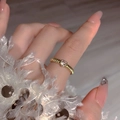 Adjustable golden ring with a pink heart-shaped stone and spiral band on model - Gold Pink Heart Gem Ring (J4861)