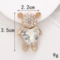 Ciondolo orsetto dorato con cristallo a cuore trasparente e strass bianchi, h 3,5cm - Orso Gemma Cuore (Bianco) (D1073)