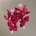 Detailed close-up of dark red fabric flower earrings with pink heart studs and white pearls - Pink Heart & Pearl