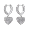 Detailed macro view of silver hoop earrings with micro-pave heart shaped pendants - Platinum White Zirconia
