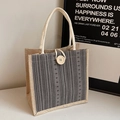 Handcrafted linen tote bag with grey vertical stripes and rustic wooden button closure - Grey Button Style