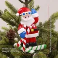 Christmas Santa Claus polymer clay ornament with candy cane hanging on Xmas tree branch - Santa with Goggles Style C
