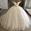 Elegant white off-shoulder lace mermaid wedding dress with vintage floral embroidery details - US 2 / White
