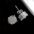 Macro shot of micro-pave geometric stud earrings with sparkling cubic zirconia on black velvet - Sparkling Round Stud Earrings [White Gold Plated]