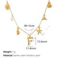 Gold ocean style stainless steel necklace featuring faux pearl and letter F bamboo pendant - Letter F (XL206)
