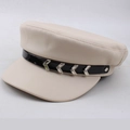 Close-up of beige PU leather flat top cap featuring silver arrow metal decorations - One Size 58cm / Beige Rippled Style