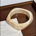 Creamy marble acetate resin bangle with rounded rectangular silhouette on wooden tray - Geometric Rhombus / Inner Diameter 65mm / Caramel Milk