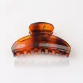 Translucent amber resin hair claw clip with elegant curved design and polished finish - Coffee Stripes
