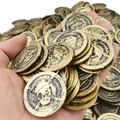 Vintage plastic pirate skull gold coins for role play parties and treasure prop kits - Simulation Pirate Coins