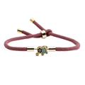 Adjustable rose pink woven rope bracelet featuring a golden elephant charm with blue stones - Pink Elephant