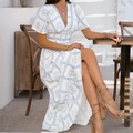 Bohemian V-neck maxi dress with blue geometric print and high waist in a resort setting - S / White Grid Floral