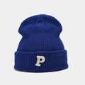 Detail shot of blue ribbed knit beanie featuring a white towel-textured P embroidery - Sapphire Blue