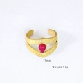 Detail view of 14k gold plated ring with pear shaped pink gemstone and V-shaped band - Rose Red Teardrop Gemstone Style