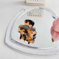 Mini tortoiseshell hair claw clip in acetate brown with glossy finish on a mirror - 3.5cm / Amber