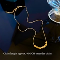 Collana minimalista in acciaio al titanio dorato con grani e catena regolabile 40+5cm - Acciaio al titanio integrale / Oro