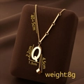 Gold titanium steel necklace with letter Q pendant and long tassel on jewelry box - Letter Q / Gold