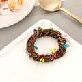Handmade woven rattan napkin ring featuring colorful berries for luxury dining decor - Colorful Berry Rattan Napkin Ring