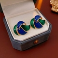Detailed shot of vintage blue and green enamel earrings with gold trim in a gift box - 56# Silver Pin-Gold-Green-Blue
