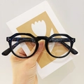 Occhiali retrò con montatura rotonda nera lenti anti luce blu e design irregolare - Nero Lucido
