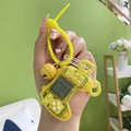 Mini yellow Tetris game console keychain with silicone strap and bell accessory - Yellow