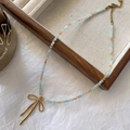 Natural tiger eye and aquamarine beaded necklace with a golden bow pendant - Bowknot Necklace XL0707