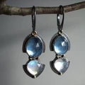 Vintage style drop earrings featuring light blue and iridescent opal stones on aged metal - Double Gem Vertical Style / Blue