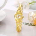 Detail of elegant gold bracelet watch with chain strap and round dial for women - Gold Round Bracelet Style (WAT04105)