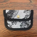 Canvas card holder with black and white jacquard pattern and vintage bronze snap button - Graffiti