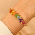 Handmade rainbow seed bead woven bracelet featuring bohemian wavy golden patterns - Multicolor Woven (N-1046)