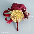Burgundy wedding boutonniere with golden floral core and satin ribbon, size 9x10cm - Corsage