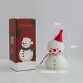 Christmas snowman scented candle with red hat and festive gift box packaging - Snowman Candle