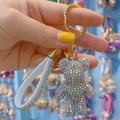 Sparkling crystal bear keychain with silver rhinestones and white wrist strap - AB Color