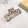 Large tortoiseshell acetate hair claw clip with vintage amber marble pattern for thick hair - Rock Yellow