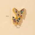 Macro detail of gold butterfly pendant showing dimensions of 2cm height and zircon inlay - Q-Double Butterfly Charm (2x1.4cm)