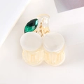 Detail of cherry-shaped hair claw with cream acrylic beads and green rhinestone leaves - Cream White Cherry