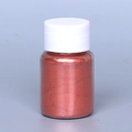 Red-brown copper mica powder in a clear cylinder jar with a white plastic lid - Pearl Powder #3 Wine Red