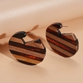 Detail of resin and wood geometric hoop earrings with striped texture and silver needle - Coffee Patchwork / Brown