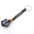 Handmade black net keychain with a natural blue sodalite stone and wood bead detail - Blue Spot Stone + Black Mesh Keychain
