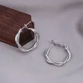Minimalist silver twisted metal hoop earrings with elegant polished double-strand design - E-032---Platinum