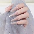 Detail of long ballerina nails with glossy nude gradient and high-shine UV finish - Gradient Nude (CBLL-07)