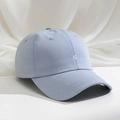 Detailed close-up showing the embroidered white letter S on the light blue twill cotton cap - One Size / Sky Blue
